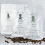 Three Ritual Specialty Coffee bags with roasted coffee beans